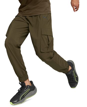 Puma पुरुषों के द ट्रेन फेवरिट वूवन कार्गो पैंट्स ग्रीन साइज़ मीडियम