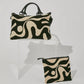 Cleobella - ABSTRACT YIN-YANG CLUTCH