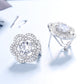 Sterling Silver Omega Flower Stud Earrings With Simulated Diamonds