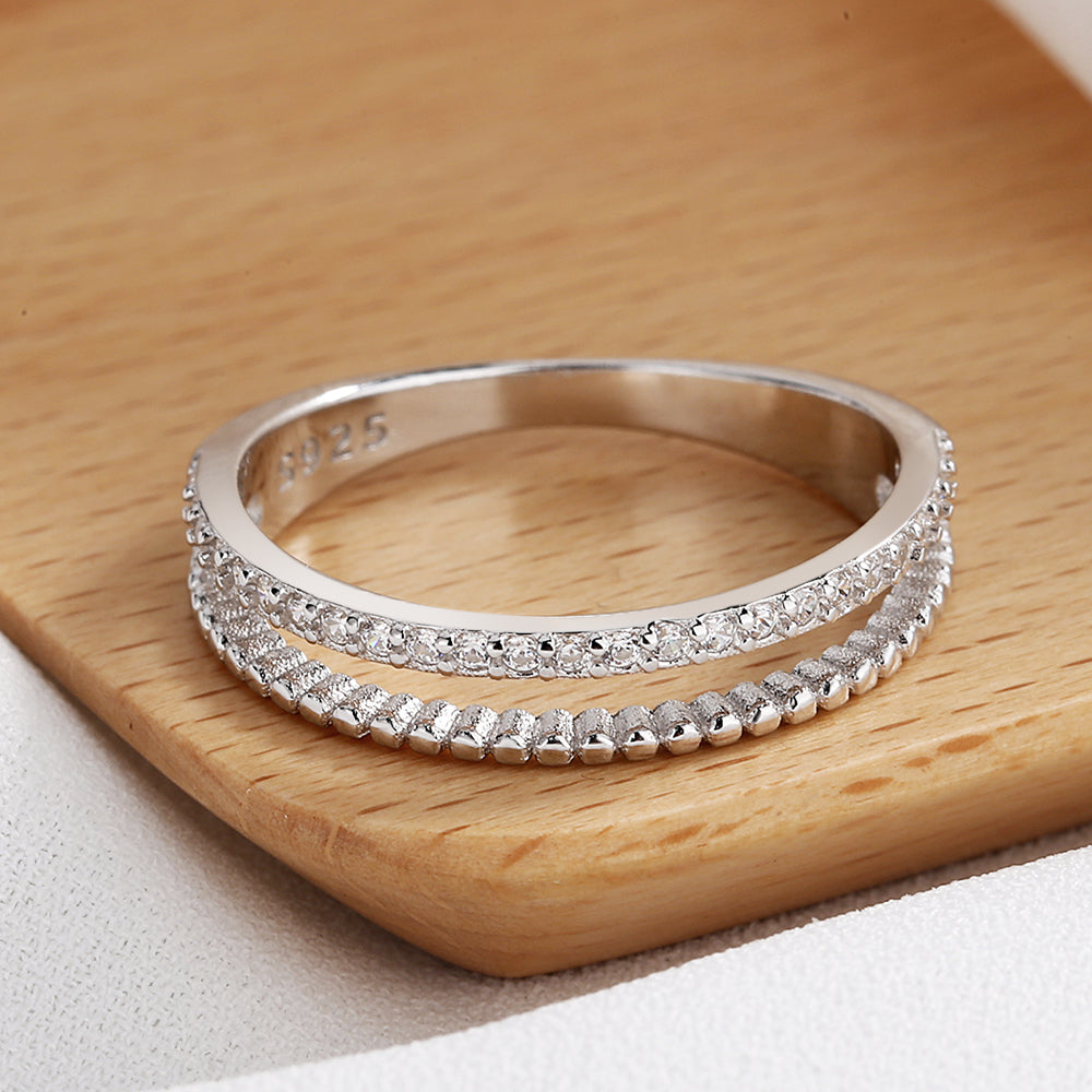 14 KT White Gold Plated Two Row Twist Ring with Simulated Diamonds