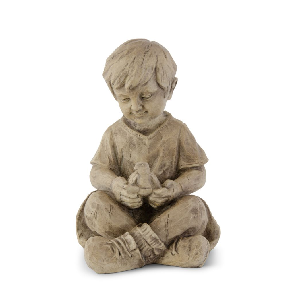 at-home-w-jorge-parez-9-tan-resin-boy-w-turtle-statue