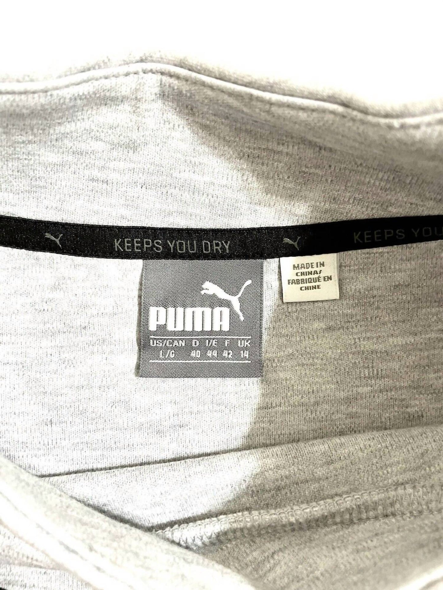 Puma - महिलाओं का पुलओवर इवोस्ट्राइप स्वेटशर्ट