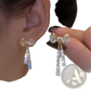Crystal Bow and Pearl Dangle Earrings in Gold