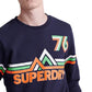 Superdry पुरुषों का डाउनहिल रेसर ग्राफिक स्वेटशर्ट नीला, साइज़ मीडियम